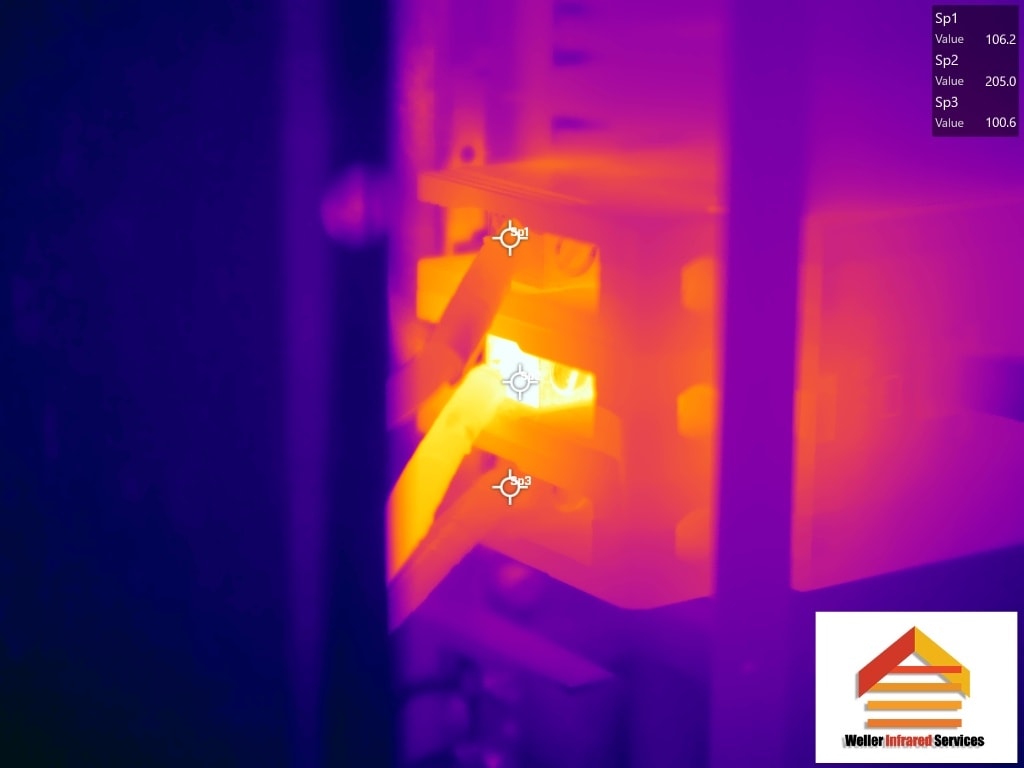 FLIR thermal scan showing 205°F electrical hot spot in Tampa commercial equipment — Weller Infrared Services